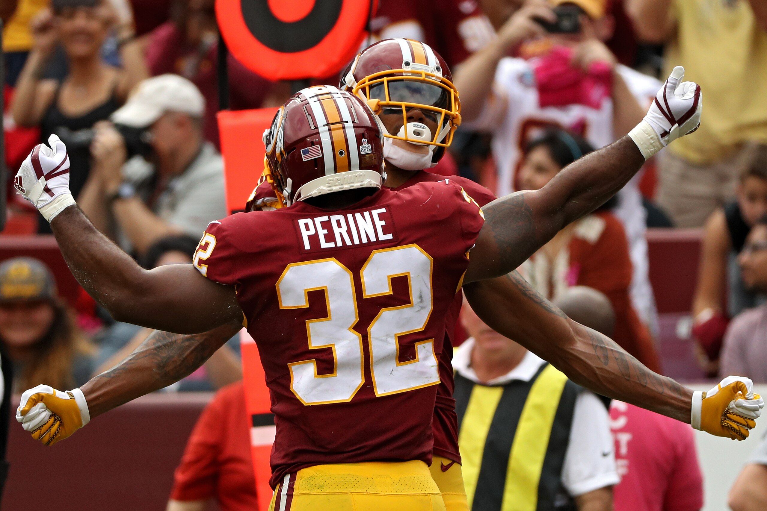 LANDOVER, MD - OCTOBER 15: running back Samaje Perine #32 of the Washington Redskins celebrates a touchdown with teammates against the San Francisco 49ers during the second quarter at FedExField on October 15, 2017 in Landover, Maryland. (Photo by Patrick