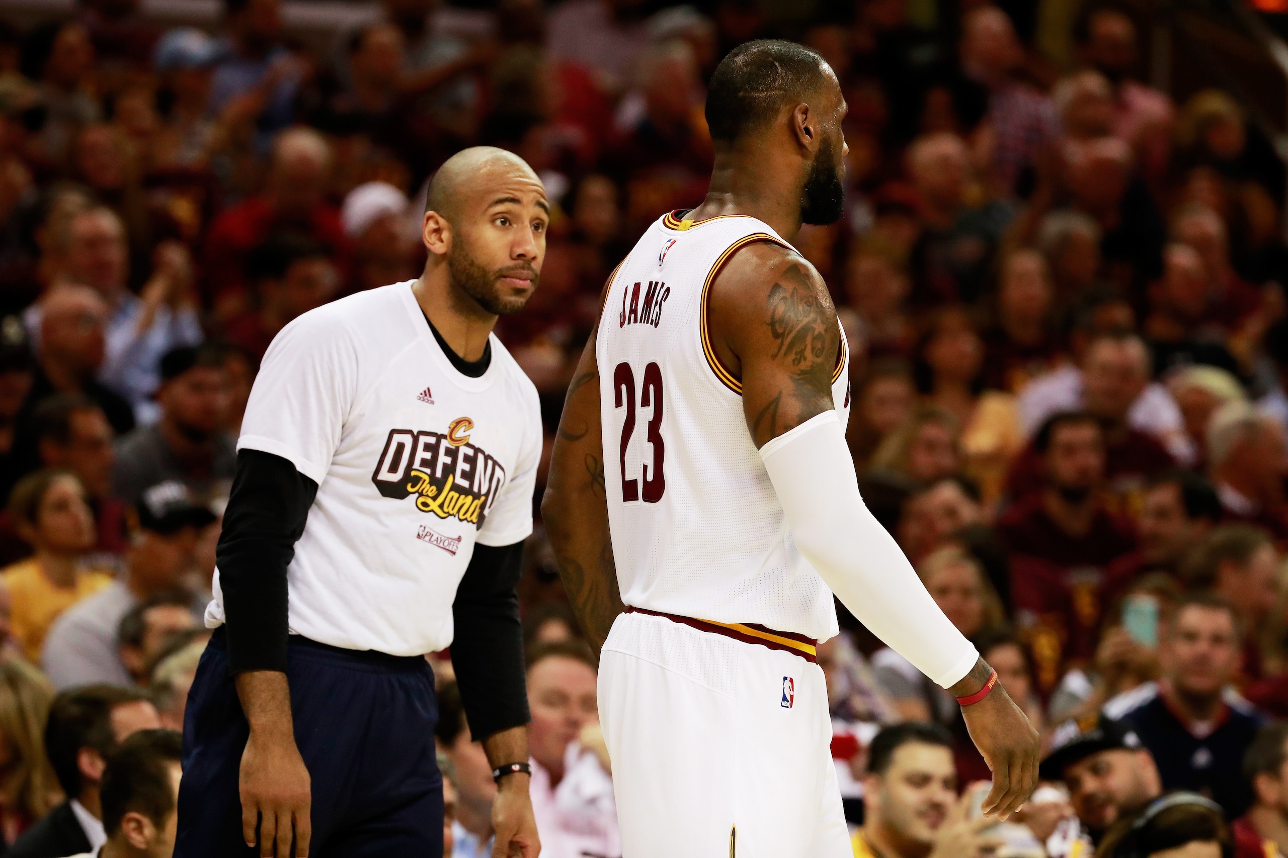 CLEVELAND, OH - MAY 23:  Dahntay Jones #30 talks to LeBron James #23 of the Cleveland Cavaliers in the first quarter against the Boston Celtics during Game Four of the 2017 NBA Eastern Conference Finals at Quicken Loans Arena on May 23, 2017 in Cleveland,
