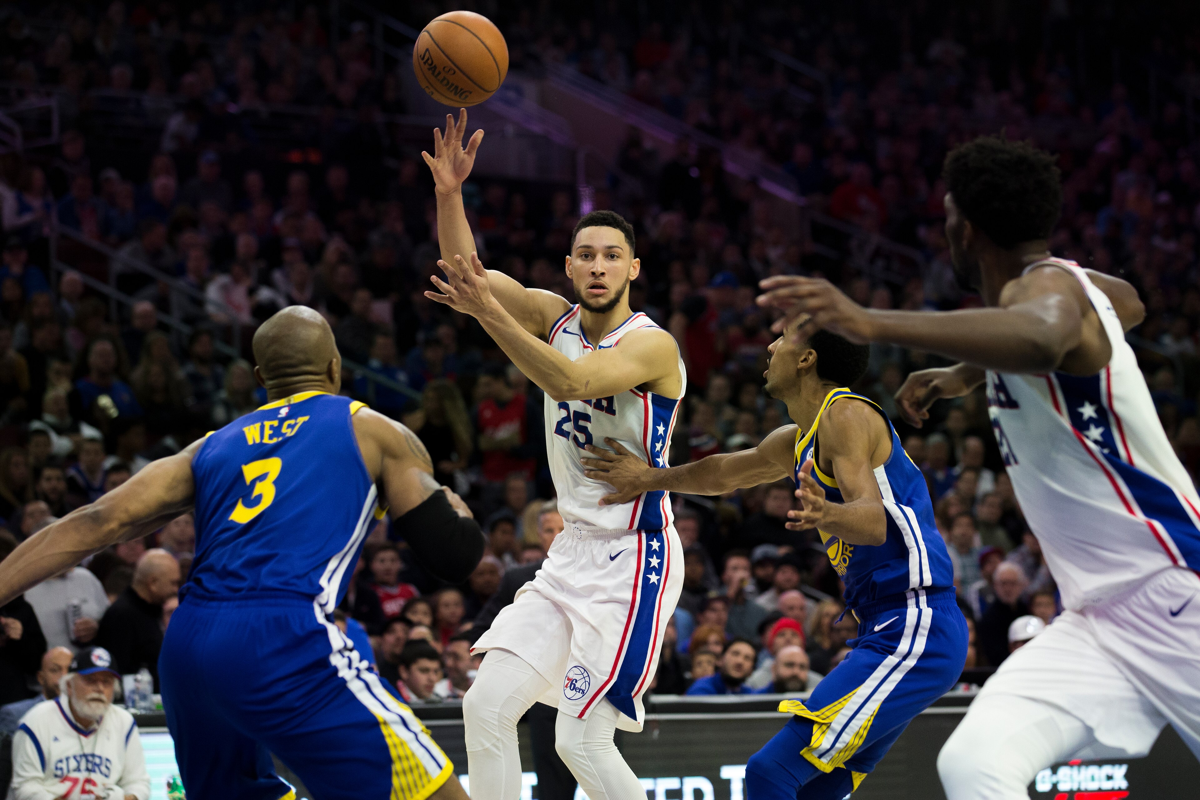 PHILADELPHIA, PA - NOVEMBER 18: Ben Simmons #25 of the Philadelphia 76ers passes the ball against the Golden State Warriors at Wells Fargo Center on November 18, 2017 in Philadelphia,Pennsylvania. NOTE TO USER: User expressly acknowledges and agrees that,
