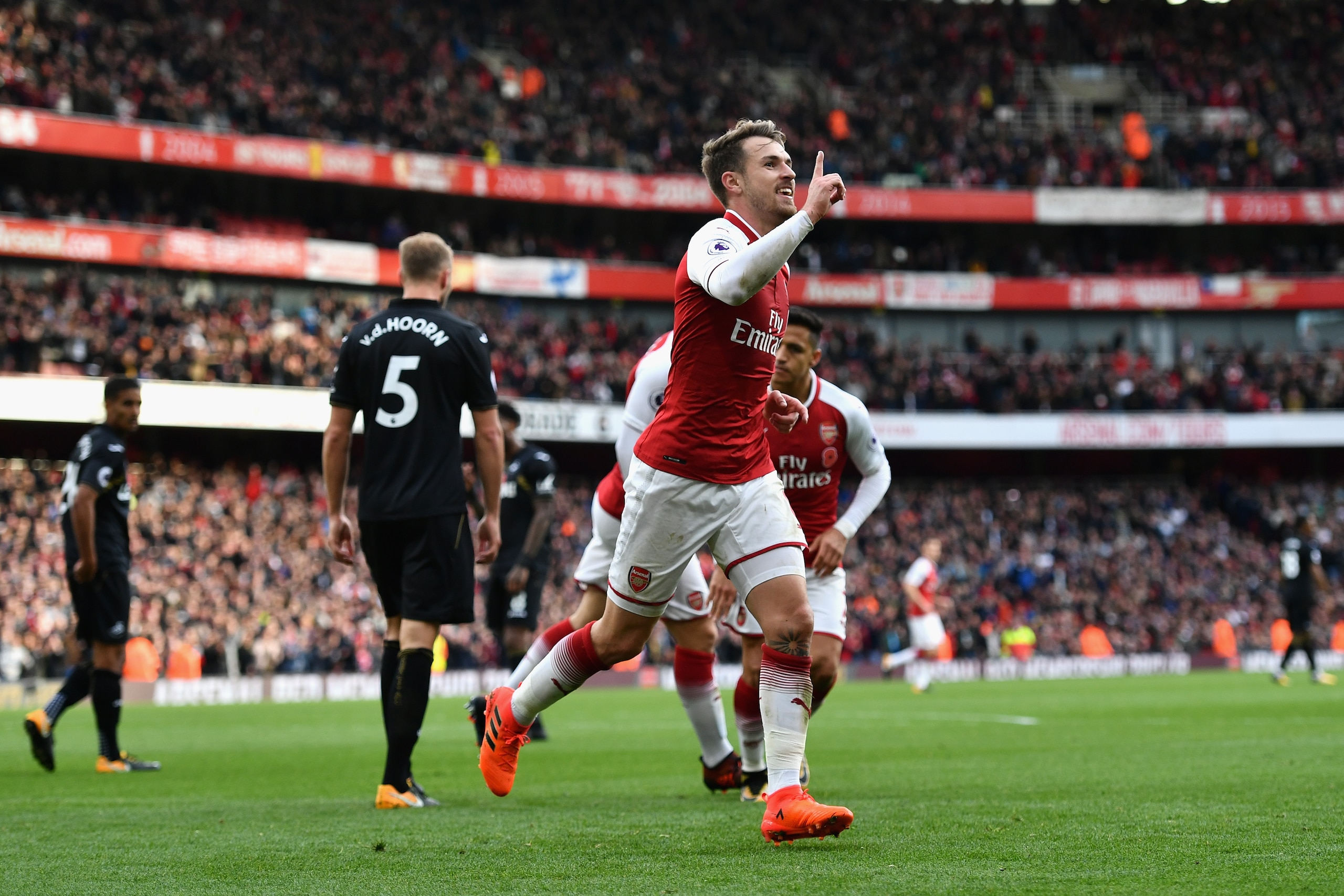 LONDON, ENGLAND - OCTOBER 28: Aaron Ramsey of Arsenal celebrates scoring his sides second goal during the Premier League match between Arsenal and Swansea City at Emirates Stadium on October 28, 2017 in London, England.  (Photo by Dan Mullan/Getty Images)