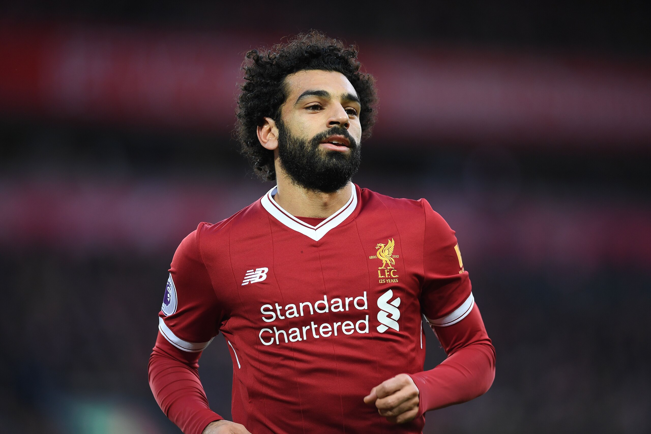 Liverpool's Egyptian midfielder Mohamed Salah celebrates scoring his team's first goal during the English Premier League football match between Liverpool and Southampton at Anfield in Liverpool, north west England on November 18, 2017. / AFP PHOTO / Paul 
