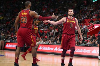 DETROIT, MI - NOVEMBER 20: Kevin Love #0 of the Cleveland Cavaliers celebrates during the second half with LeBron James #23 while playing the Detroit Pistons at Little Caesars Arena on November 20, 2017 in Detroit, Michigan. Cleveland won the game 116-88.