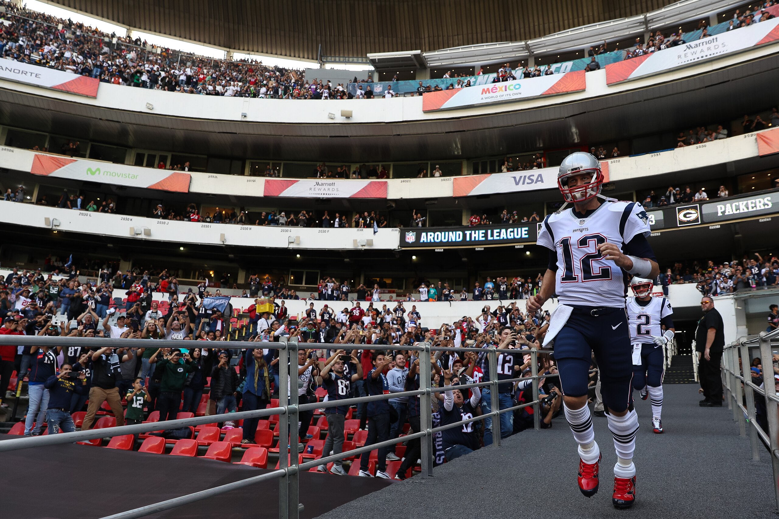 MEXICO CITY, MEXICO - NOVEMBER 19:  Tom Brady #12 of the New England Patriots takes the field for warm ups prior to the game against the Oakland Raiders at Estadio Azteca on November 19, 2017 in Mexico City, Mexico.  (Photo by Buda Mendes/Getty Images)