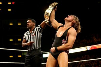 Pete Dunne celebrates his UK Championship win at TakeOver: Chicago.