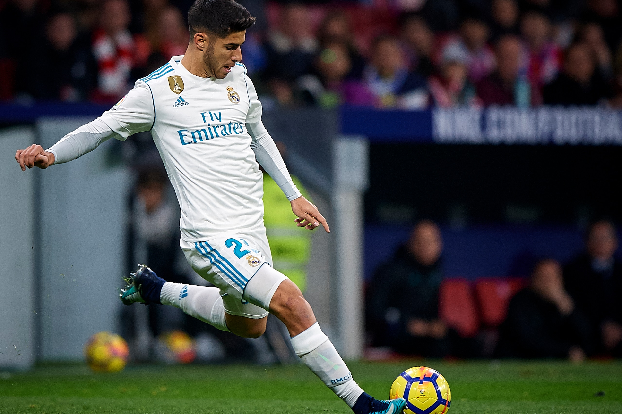 MADRID, SPAIN - NOVEMBER 18:  Marco Asensio of Real Madrid in action during the La Liga match between Atletico Madrid and Real Madrid at Wanda Metropolitano Stadium on November 18, 2017 in Madrid, Spain.  (Photo by fotopress/Getty Images)