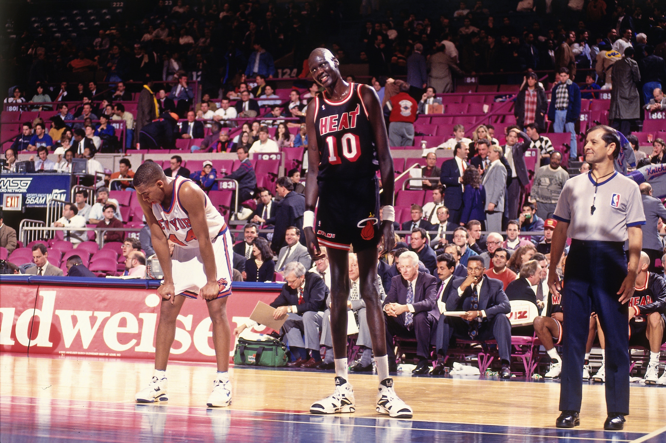 NEW YORK CITY - 1994: Manute Bol #10 of the Miami Heat looks on during a game played circa 1994 at Madison Square Gardenin New York City. NOTE TO USER: User expressly acknowledges and agrees that, by downloading and or using this photograph, User is conse