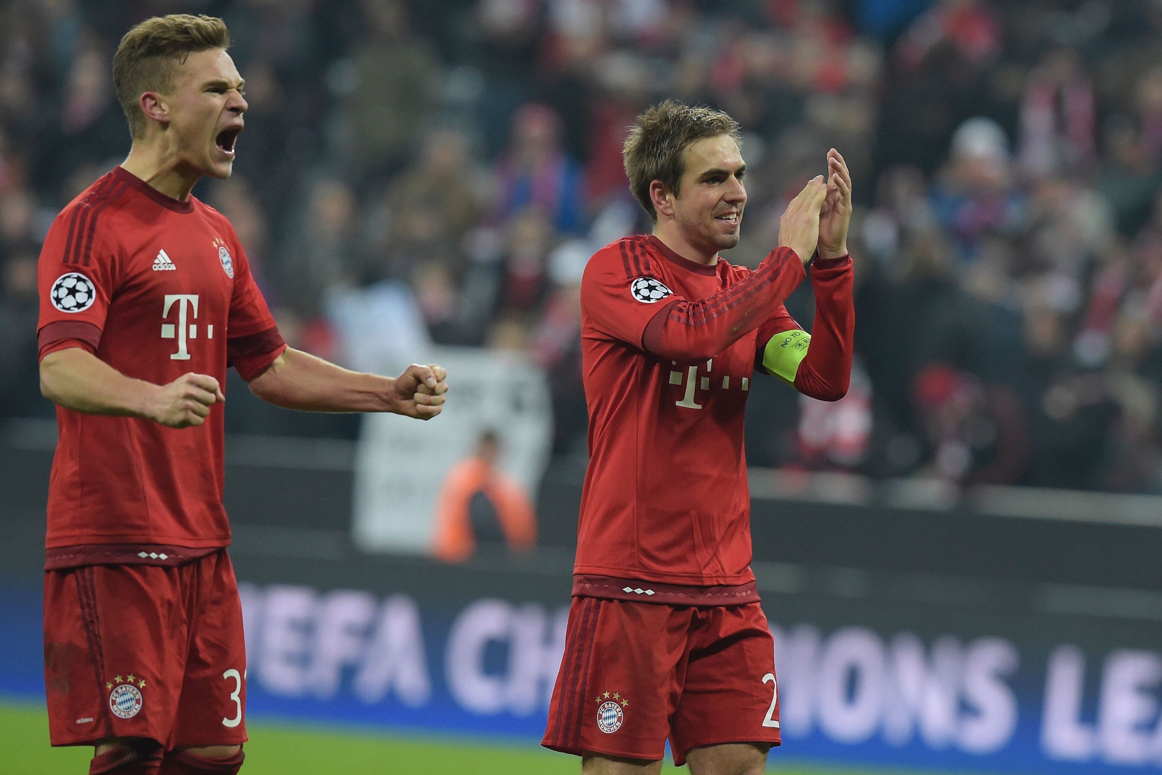 Bayern Munich's midfielder Joshua Kimmich (L) and Bayern Munich's defender Philipp Lahm celebrate after the UEFA Champions League, Round of 16, second leg football match FC Bayern Munich v Juventus in Munich, southern Germany on March 16, 2016. / AFP / TO Bayern Munich's midfielder Joshua Kimmich (L) and Bayern Munich's defender Philipp Lahm celebrate after the UEFA Champions League, Round of 16, second leg football match FC Bayern Munich v Juventus in Munich, southern Germany on March 16, 2016. / AFP / TO