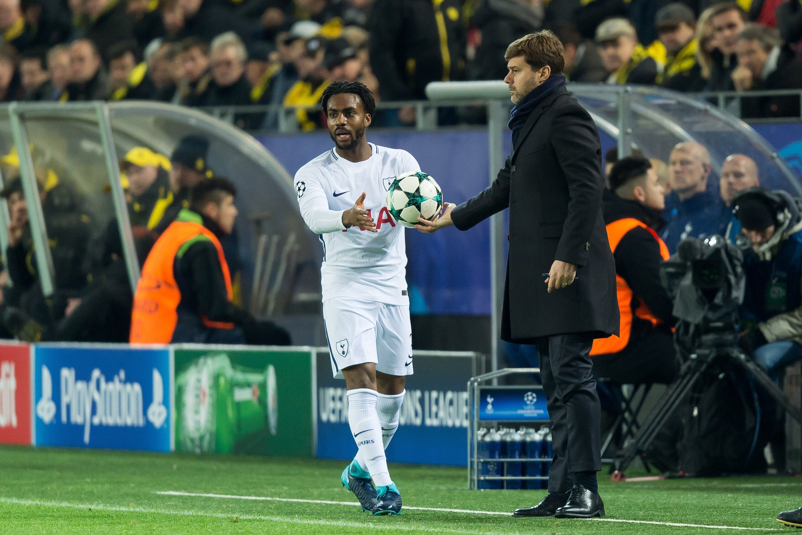 DORTMUND, GERMANY - NOVEMBER 21: Head coach Mauricio Pochettino of Tottenham Hotspur gives Danny Rose of Tottenham Hotspur the ball during the UEFA Champions League group H match between Borussia Dortmund and Tottenham Hotspur at Signal Iduna Park on Nove