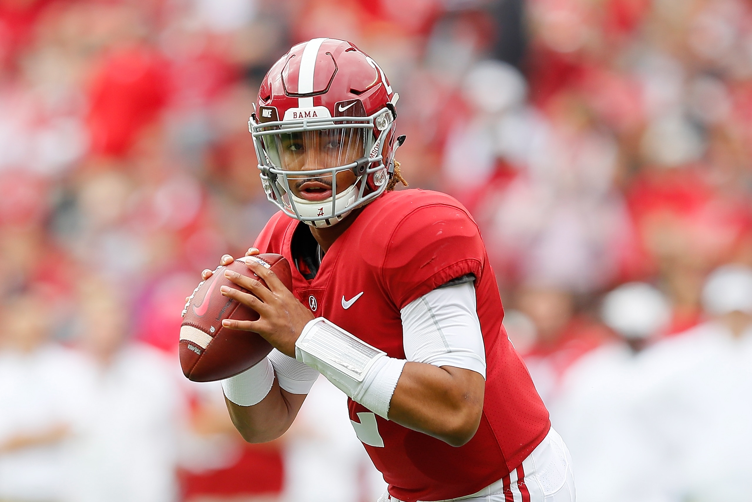 TUSCALOOSA, AL - NOVEMBER 18:  Jalen Hurts #2 of the Alabama Crimson Tide rolls out to pass against the Mercer Bears at Bryant-Denny Stadium on November 18, 2017 in Tuscaloosa, Alabama.  (Photo by Kevin C. Cox/Getty Images)