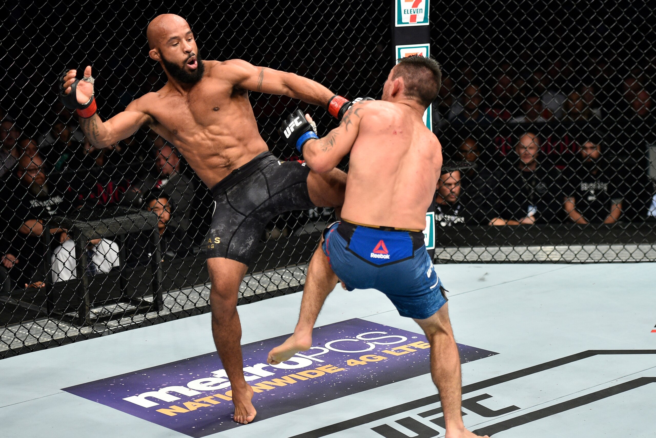 LAS VEGAS, NV - OCTOBER 07: (L-R) Demetrious Johnson kicks Ray Borg in their UFC flyweight championship bout during the UFC 216 event inside T-Mobile Arena on October 7, 2017 in Las Vegas, Nevada. (Photo by Jeff Bottari/Zuffa LLC/Zuffa LLC via Getty Ima LAS VEGAS, NV - OCTOBER 07: (L-R) Demetrious Johnson kicks Ray Borg in their UFC flyweight championship bout during the UFC 216 event inside T-Mobile Arena on October 7, 2017 in Las Vegas, Nevada. (Photo by Jeff Bottari/Zuffa LLC/Zuffa LLC via Getty Ima