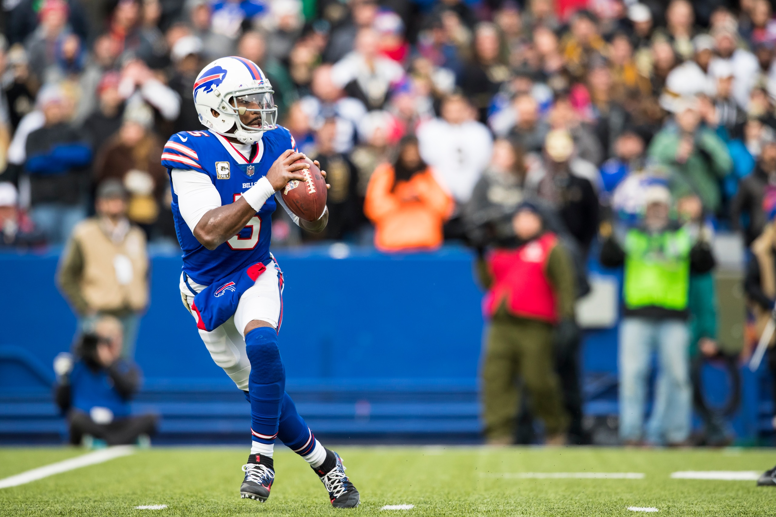 ORCHARD PARK, NY - NOVEMBER 12:  Tyrod Taylor #5 of the Buffalo Bills moves in the pocket during the third quarter against the New Orleans Saints at New Era Field on November 12, 2017 in Orchard Park, New York. New Orleans defeats Buffalo 47-10.  (Photo b
