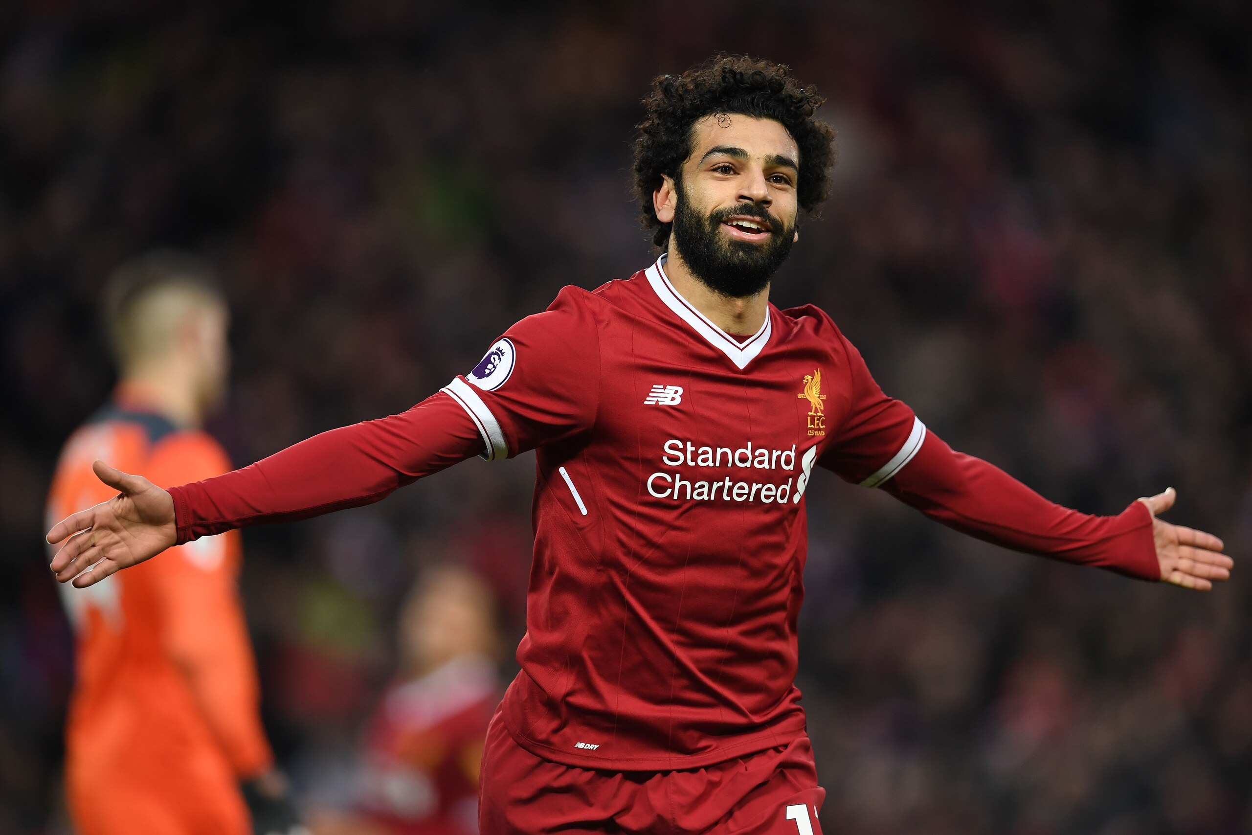 Liverpool's Egyptian midfielder Mohamed Salah celebrates scoring his team's second goal during the English Premier League football match between Liverpool and Southampton at Anfield in Liverpool, north west England on November 18, 2017. / AFP PHOTO / Paul