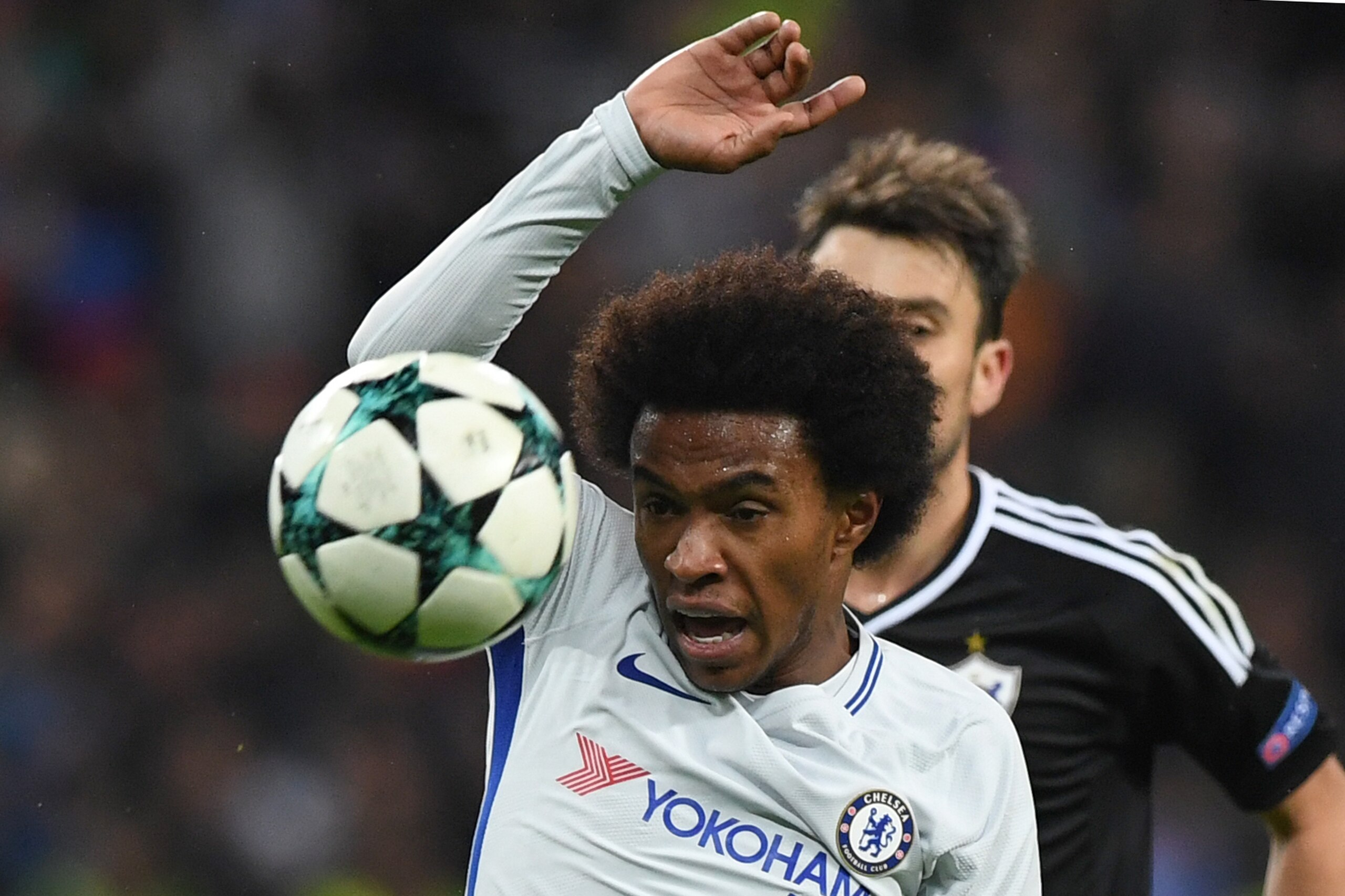 Chelsea's midfielder from Brazil Willian in action during the UEFA Champions League Group C football match between Qarabag FK and Chelsea FC in Baku on November 22, 2017. / AFP PHOTO / Kirill KUDRYAVTSEV        (Photo credit should read KIRILL KUDRYAVTSEV