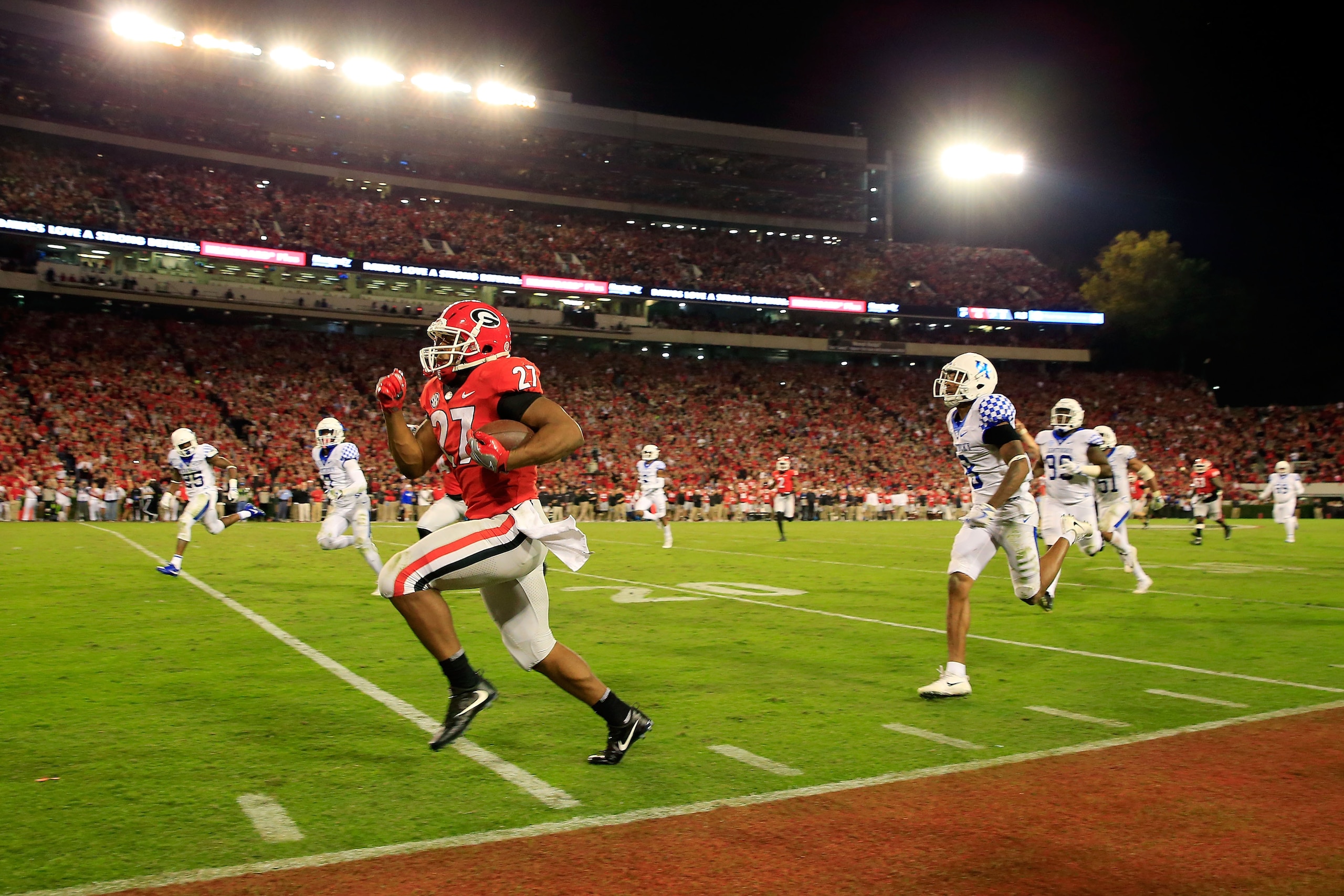 ATHENS, GA - NOVEMBER 18: Nick Chubb #27 of the Georgia Bulldogs runs for a touchdown during the second half against the Kentucky Wildcats at Sanford Stadium on November 18, 2017 in Athens, Georgia. (Photo by Daniel Shirey/Getty Images) ATHENS, GA - NOVEMBER 18: Nick Chubb #27 of the Georgia Bulldogs runs for a touchdown during the second half against the Kentucky Wildcats at Sanford Stadium on November 18, 2017 in Athens, Georgia. (Photo by Daniel Shirey/Getty Images)