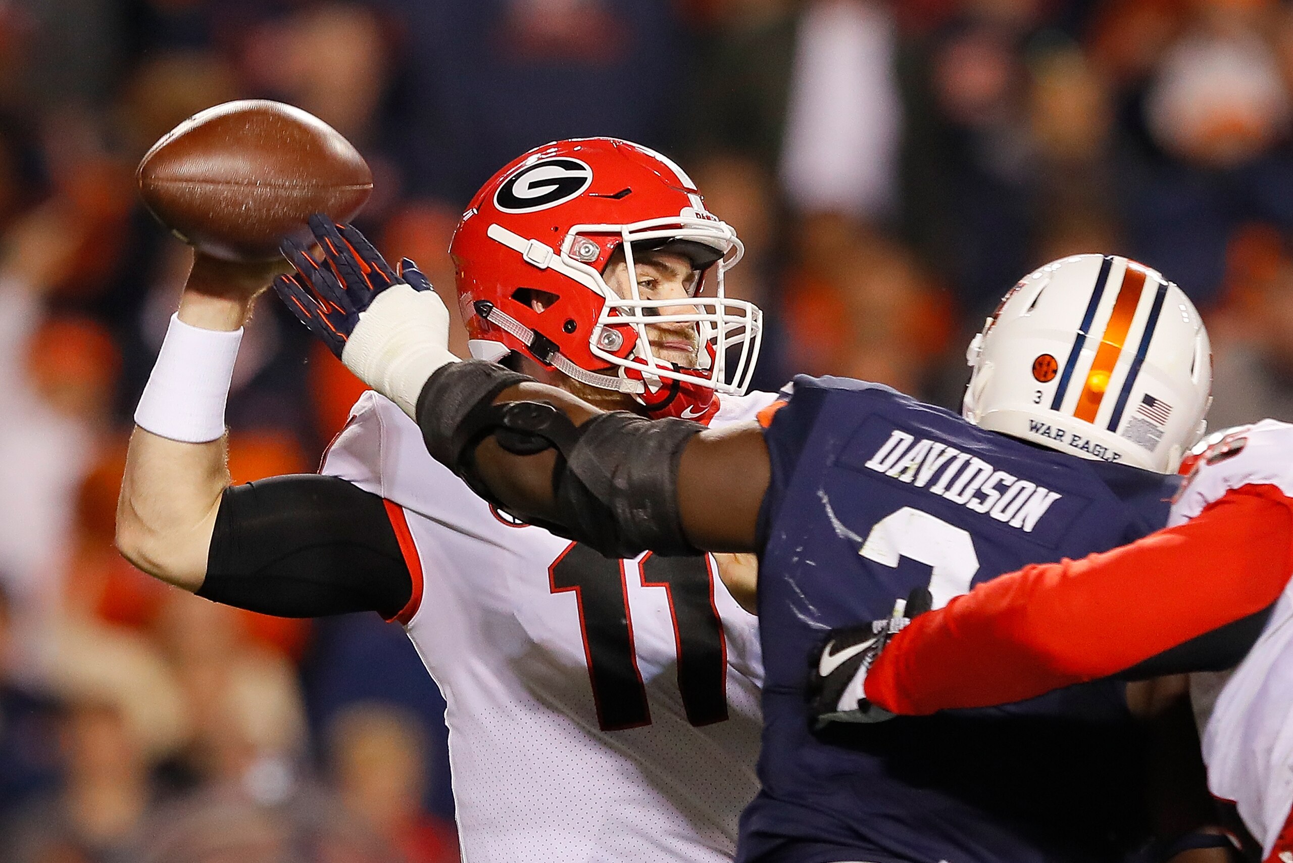 AUBURN, AL - NOVEMBER 11:  Marlon Davidson #3 of the Auburn Tigers pressures Jake Fromm #11 of the Georgia Bulldogs at Jordan Hare Stadium on November 11, 2017 in Auburn, Alabama.  (Photo by Kevin C. Cox/Getty Images)