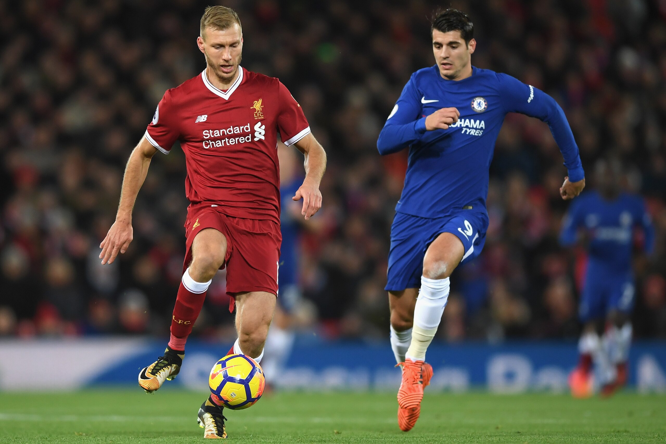LIVERPOOL, ENGLAND - NOVEMBER 25:  Ragnar Klavan of Liverpool and Alvaro Morata of Chelsea battle for the ball during the Premier League match between Liverpool and Chelsea at Anfield on November 25, 2017 in Liverpool, England.  (Photo by Shaun Botterill/