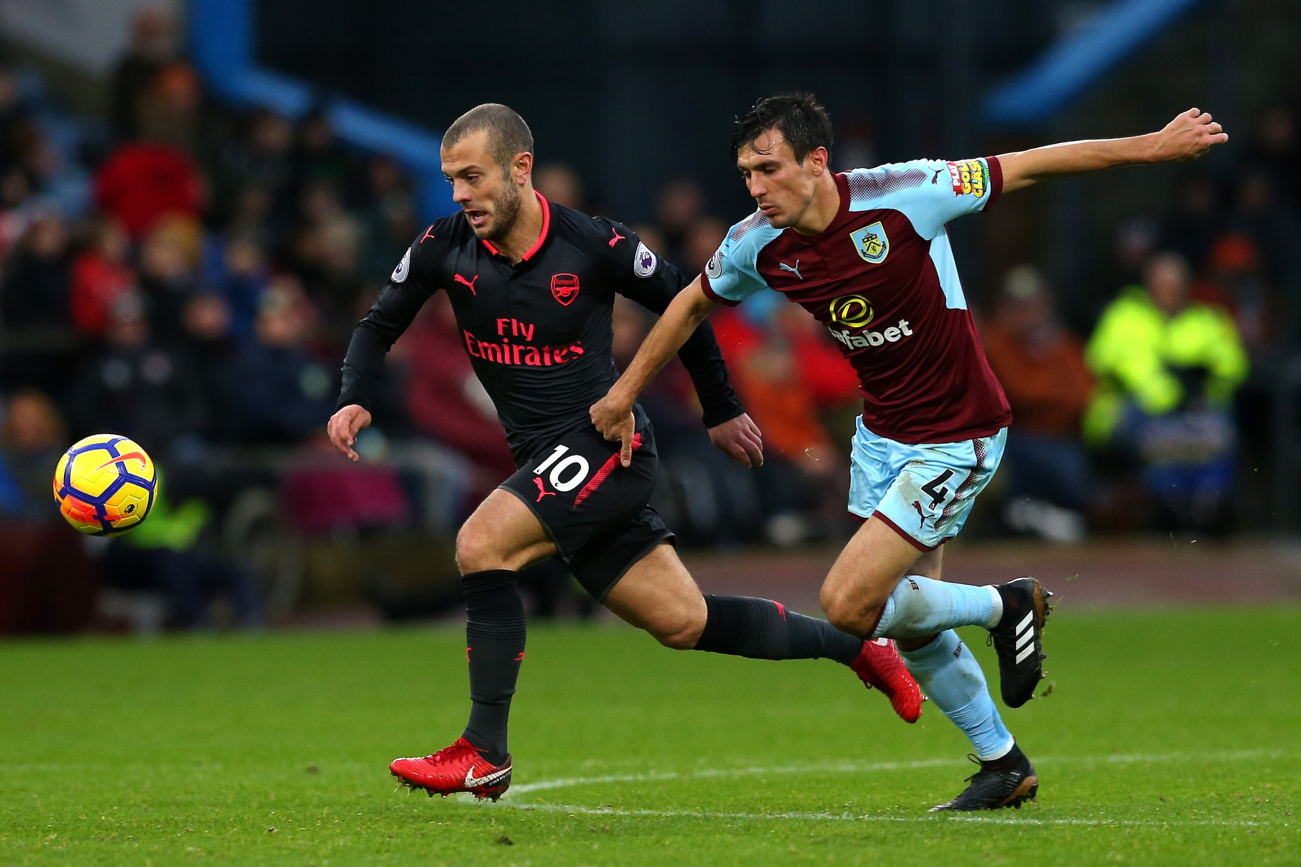 BURNLEY, ENGLAND - NOVEMBER 26:  Jack Wilshere of Arsenal and Jack Cork of Burnley during the Premier League match between Burnley and Arsenal at Turf Moor on November 26, 2017 in Burnley, England.  (Photo by Jan Kruger/Getty Images)