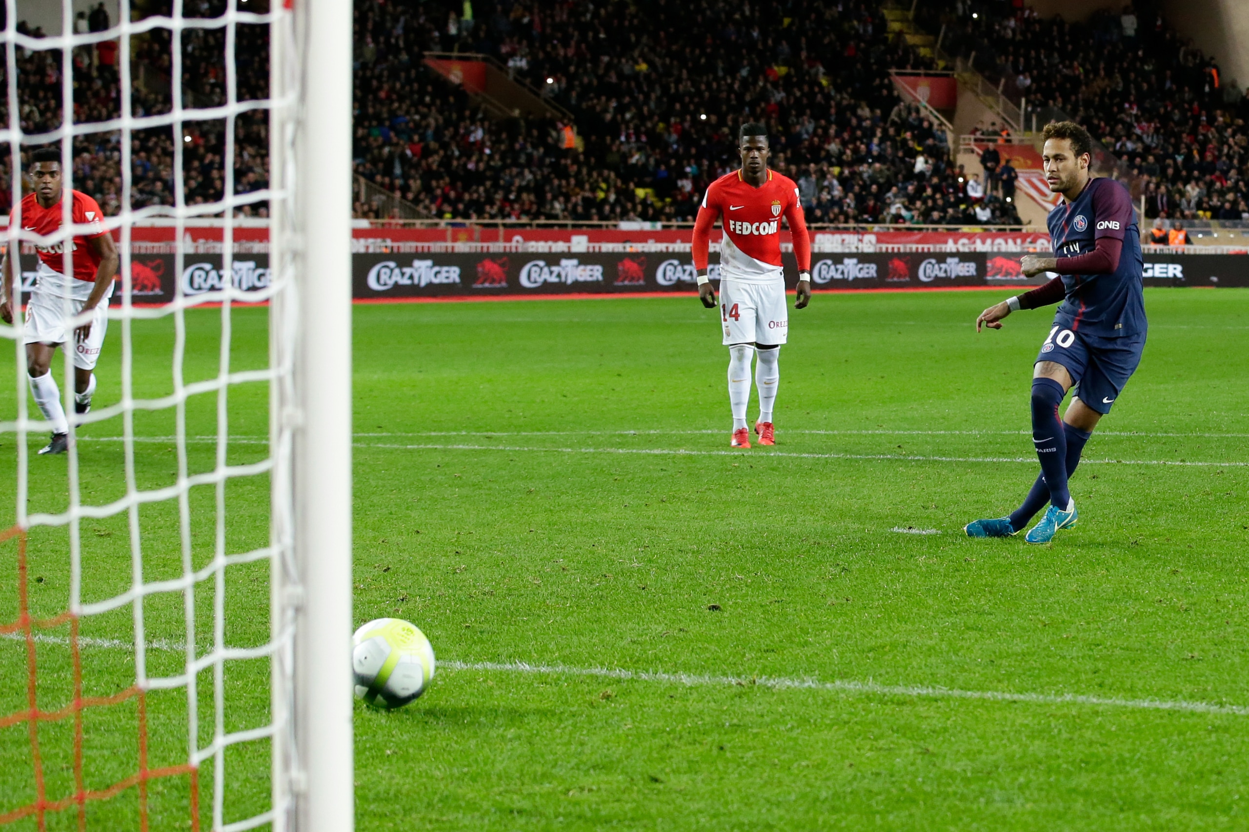MONACO, MONACO - NOVEMBER 26: Neymar Jr of Paris Saint Germain scores the second goal to make it 0-2 during the French League 1  match between AS Monaco v Paris Saint Germain at the Stade Louis II on November 26, 2017 in Monaco Monaco (Photo by Eric Verho