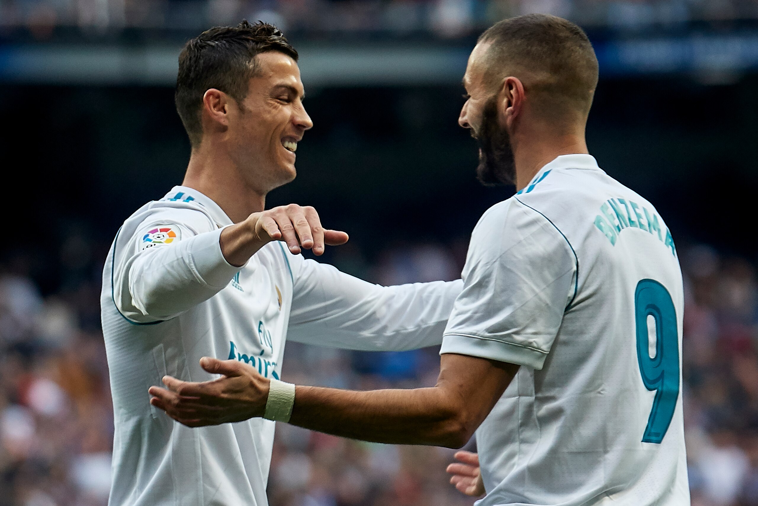 MADRID, SPAIN - NOVEMBER 25:  Karim Benzema of Real Madrid and Cristiano Ronaldo of Real Madrid  celebrate the opening goal during the La Liga match between Real Madrid and Malaga at Estadio Santiago Bernabeu on November 25, 2017 in Madrid, Spain.  (Photo