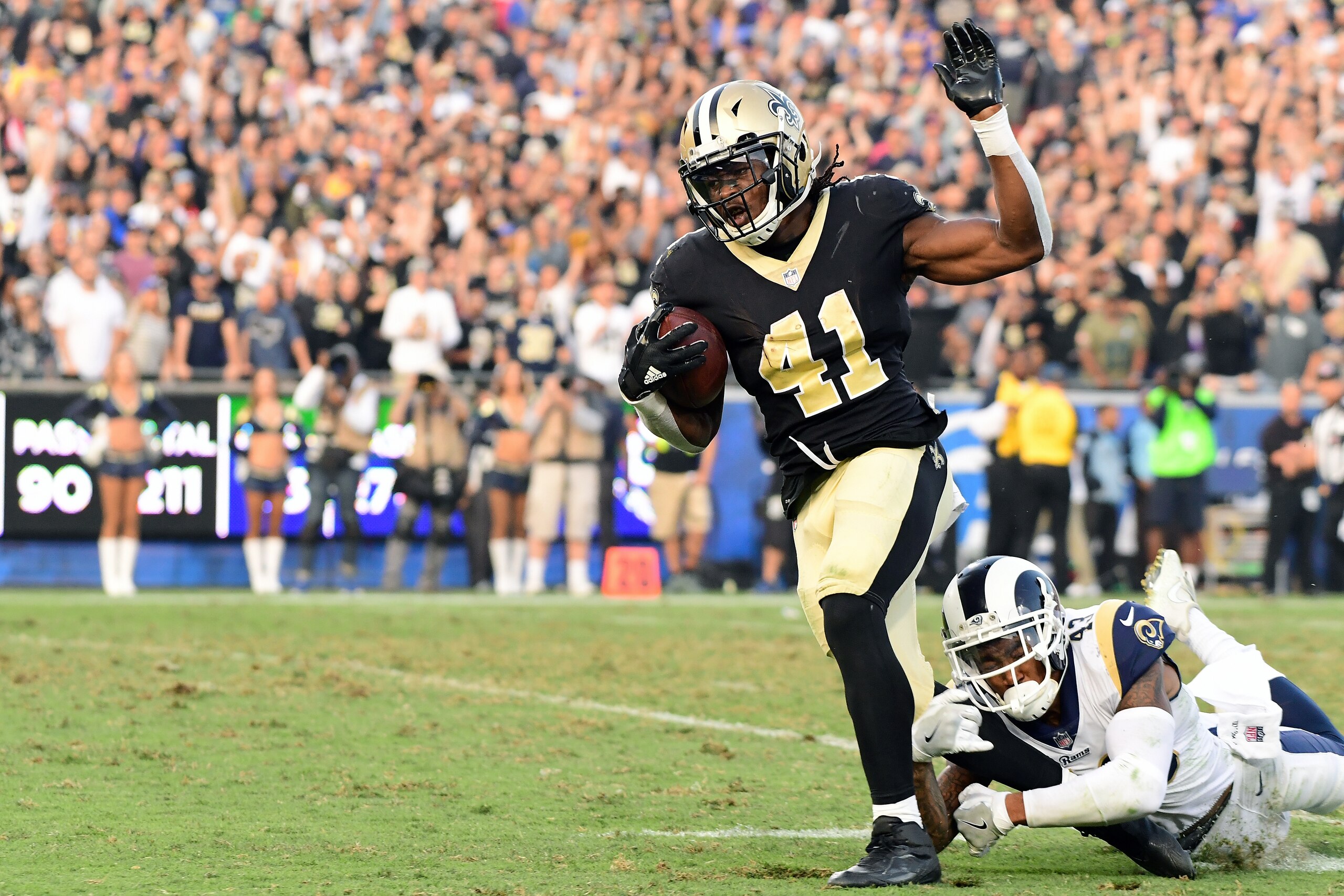 LOS ANGELES, CA - NOVEMBER 26:  Alvin Kamara #41 of the New Orleans Saints is chased down by John Johnson #43 of the Los Angeles Rams during the fourth quarter at the Los Angeles Memorial Coliseum on November 26, 2017 in Los Angeles, California.  (Photo b