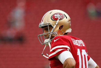 SANTA CLARA, CA - NOVEMBER 26: Jimmy Garoppolo #10 of the San Francisco 49ers looks on during the warm up before the game against the Seattle Seahawks at Levi's Stadium on November 26, 2017 in Santa Clara, California. (Photo by Lachlan Cunningham/Getty Im