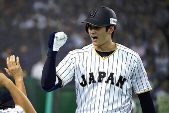 TOKYO, JAPAN - NOVEMBER 12:  Shohei Ohtani #16 of Japan celebrates after hitting a solo homer in the fifth inning during the international friendly match between Japan and Netherlands at the Tokyo Dome on November 12, 2016 in Tokyo, Japan.  (Photo by Mast