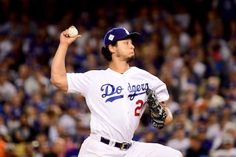 LOS ANGELES, CA - NOVEMBER 01:  Yu Darvish #21 of the Los Angeles Dodgers pitches during the second inning against the Houston Astros in game seven of the 2017 World Series at Dodger Stadium on November 1, 2017 in Los Angeles, California.  (Photo by Harry