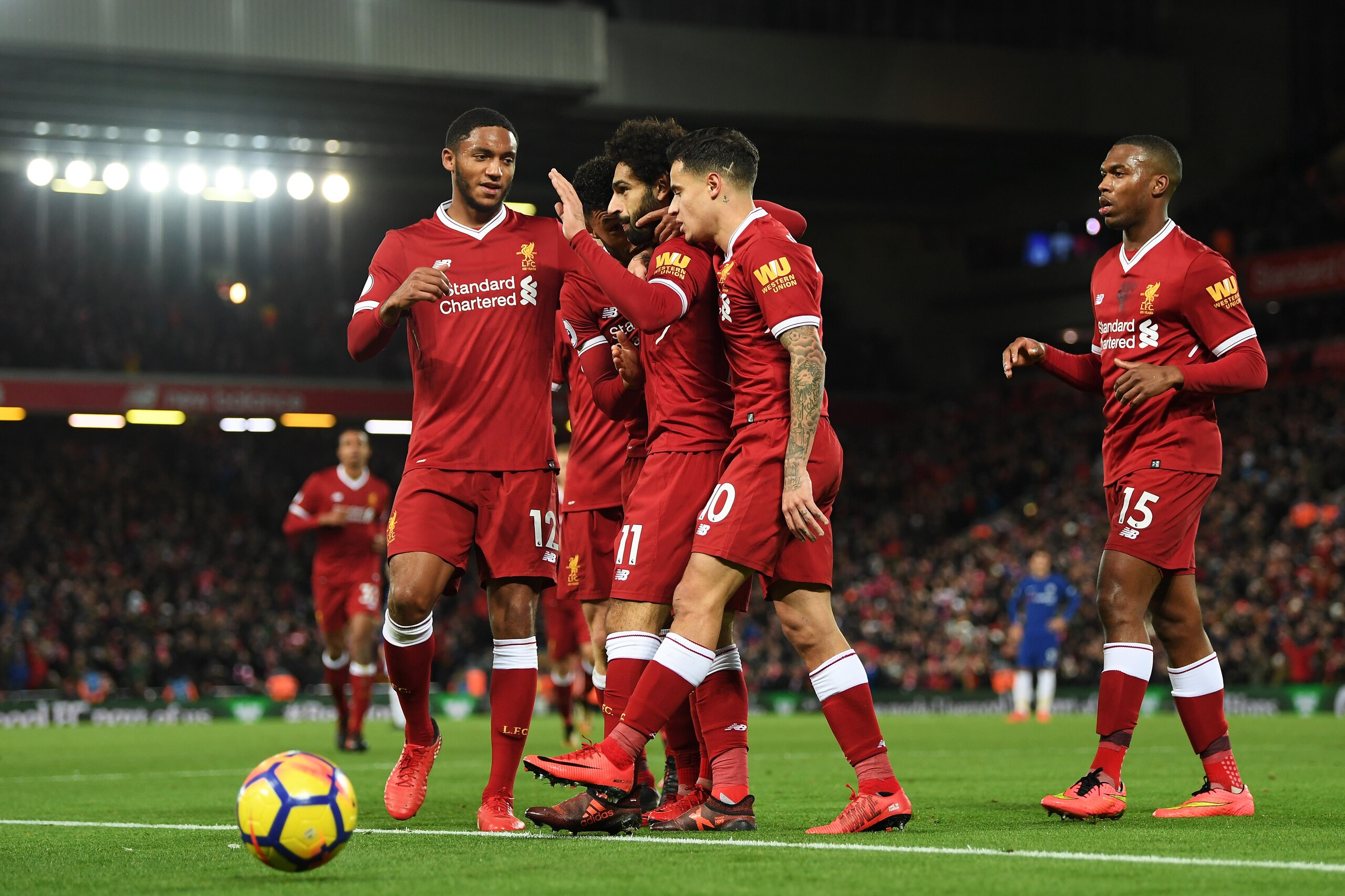 LIVERPOOL, ENGLAND - NOVEMBER 25: Mohamed Salah of Liverpool celebrates scoring his sides first goal with his Liverpool team mates during the Premier League match between Liverpool and Chelsea at Anfield on November 25, 2017 in Liverpool, England. (Photo LIVERPOOL, ENGLAND - NOVEMBER 25: Mohamed Salah of Liverpool celebrates scoring his sides first goal with his Liverpool team mates during the Premier League match between Liverpool and Chelsea at Anfield on November 25, 2017 in Liverpool, England. (Photo