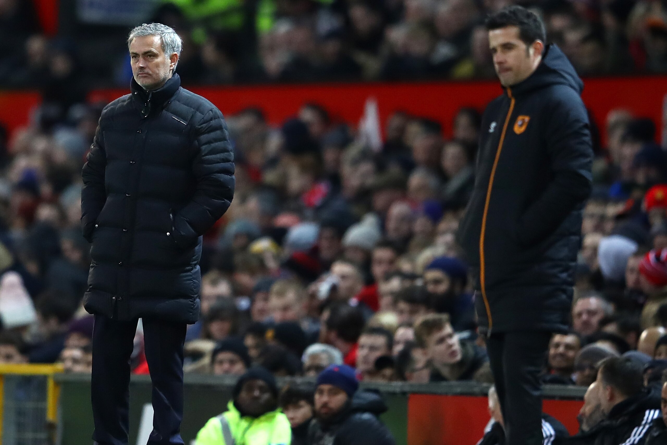 MANCHESTER, ENGLAND - JANUARY 10: Jose Mourinho, Manager of Manchester United (R) and Marco Silva, Manager of Hull City (L) look on during the EFL Cup Semi-Final First Leg match between Manchester United and Hull City at Old Trafford on January 10, 2017 MANCHESTER, ENGLAND - JANUARY 10: Jose Mourinho, Manager of Manchester United (R) and Marco Silva, Manager of Hull City (L) look on during the EFL Cup Semi-Final First Leg match between Manchester United and Hull City at Old Trafford on January 10, 2017
