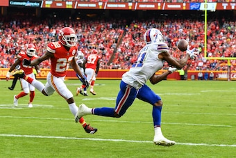 KANSAS CITY, MO - NOVEMBER 26: Wide receiver Zay Jones #11 of the Buffalo Bills catches a ball that would lead to the first touchdown of the game in front of cornerback Marcus Peters #22 of the Kansas City Chiefs during the first quarter at Arrowhead Stad