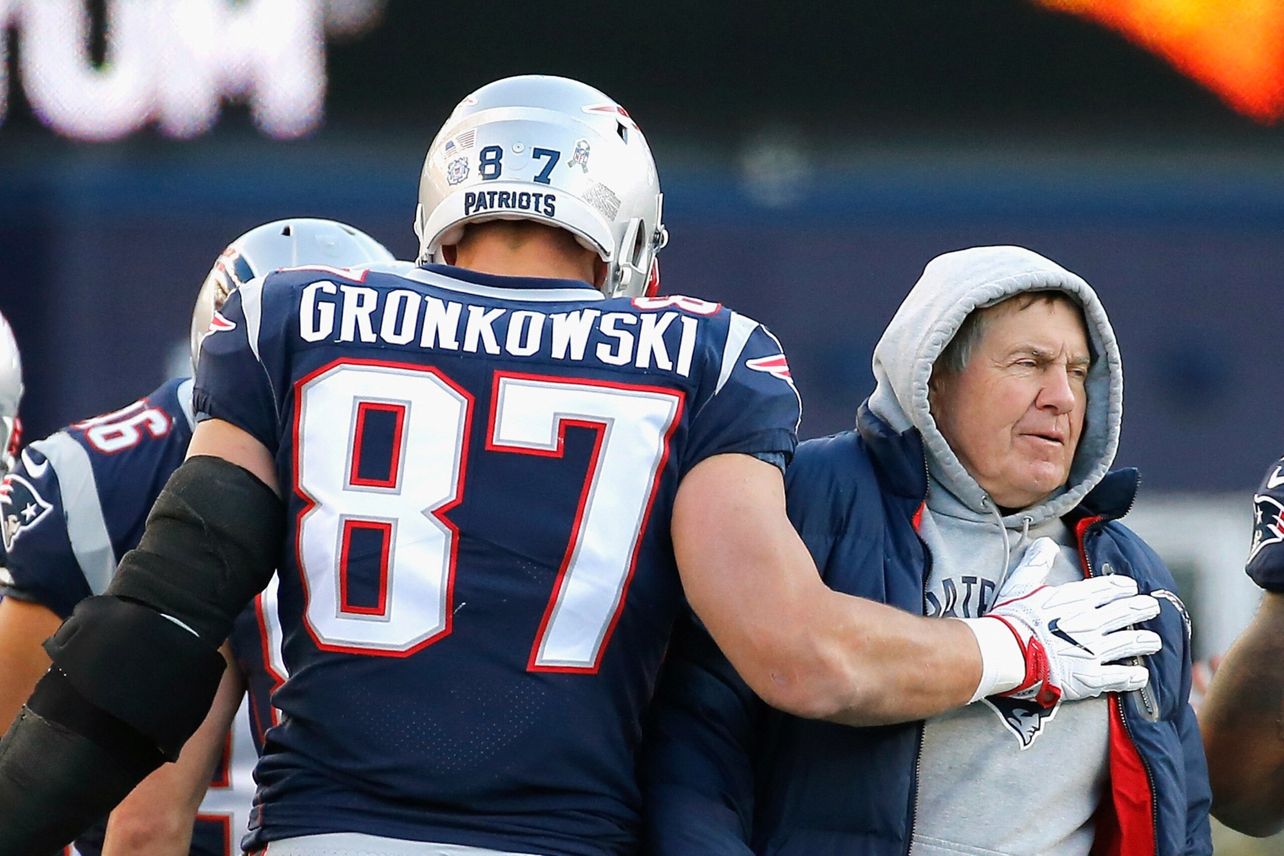 FOXBORO, MA - NOVEMBER 26:  Rob Gronkowski #87 of the New England Patriots reacts with head coach Bill Belichick after catching a touchdown pass during the third quarter of a game against the Miami Dolphins at Gillette Stadium on November 26, 2017 in Foxb
