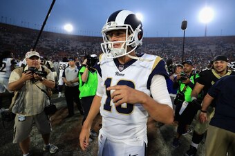 LOS ANGELES, CA - NOVEMBER 26:  Jared Goff #16 of the Los Angeles Rams walks off the field after a game against the New Orleans Saints  at Los Angeles Memorial Coliseum on November 26, 2017 in Los Angeles, California.  The Los Angeles Rams defeated the Ne