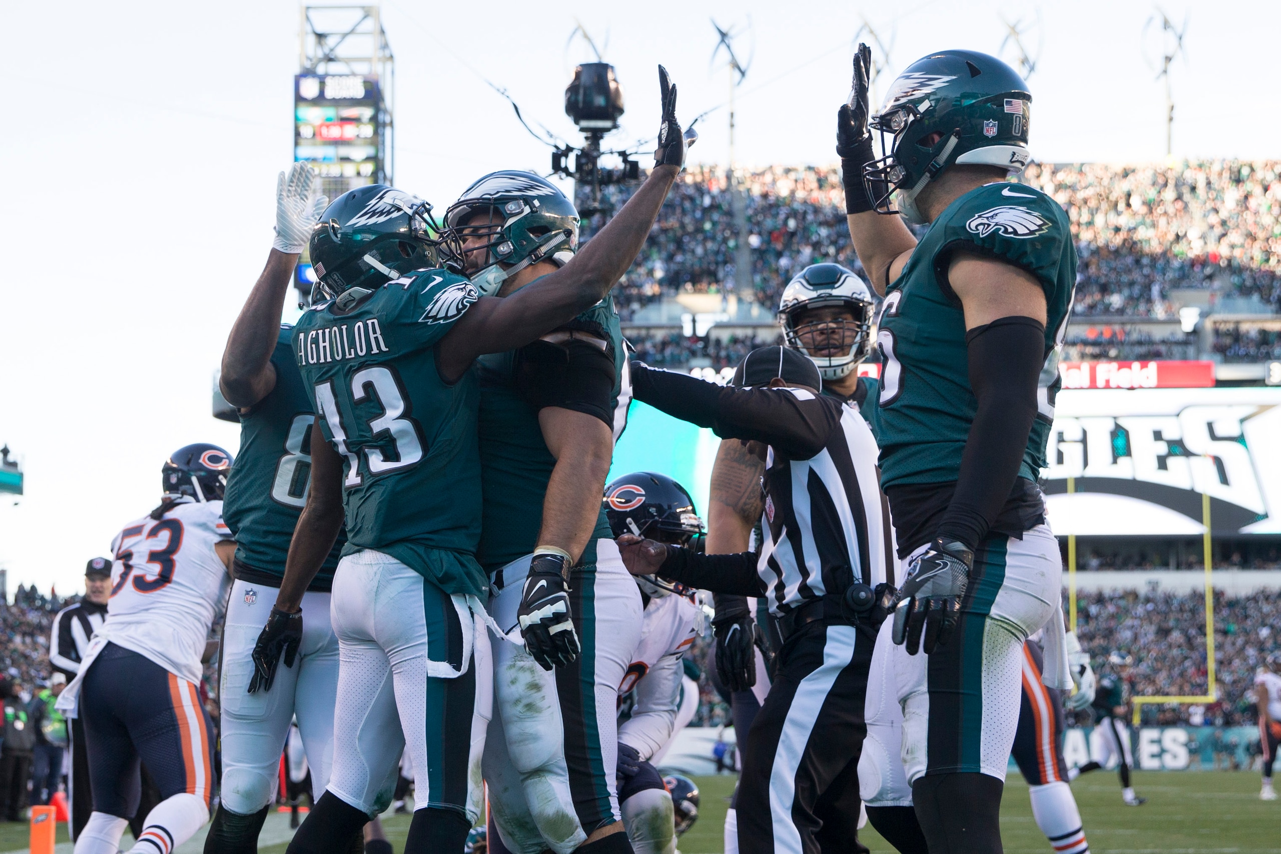 PHILADELPHIA, PA - NOVEMBER 26: Nelson Agholor #13 of the Philadelphia Eagles celebrates with Stefen Wisniewski #62, and Zach Ertz #86 after picking up a fumble by Jay Ajayi to score a touchdown in the fourth quarter against the Chicago Bears at Lincoln F