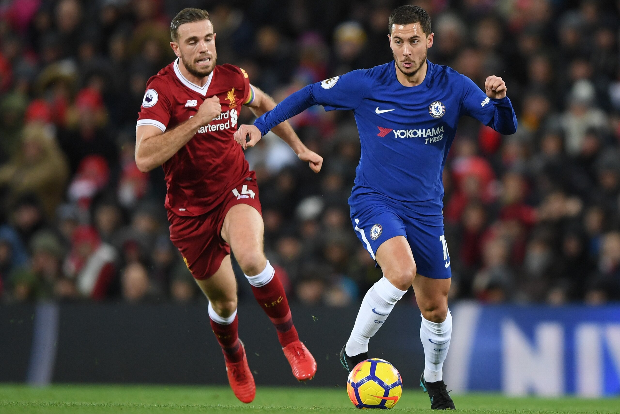LIVERPOOL, ENGLAND - NOVEMBER 25:  Jordan Henderson of Liverpool chases down Eden Hazard of Chelsea during the Premier League match between Liverpool and Chelsea at Anfield on November 25, 2017 in Liverpool, England.  (Photo by Shaun Botterill/Getty Image