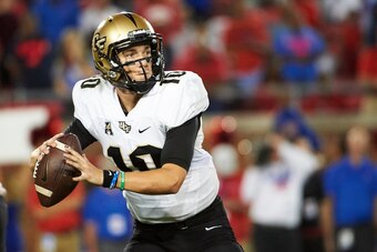 DALLAS, TX - NOVEMBER 4:  McKenzie Milton #10 of the UCF Knights throws an 80 yard touchdown pass against the SMU Mustangs during the first half at Gerald J. Ford Stadium on November 4, 2017 in Dallas, Texas.  (Photo by Cooper Neill/Getty Images)