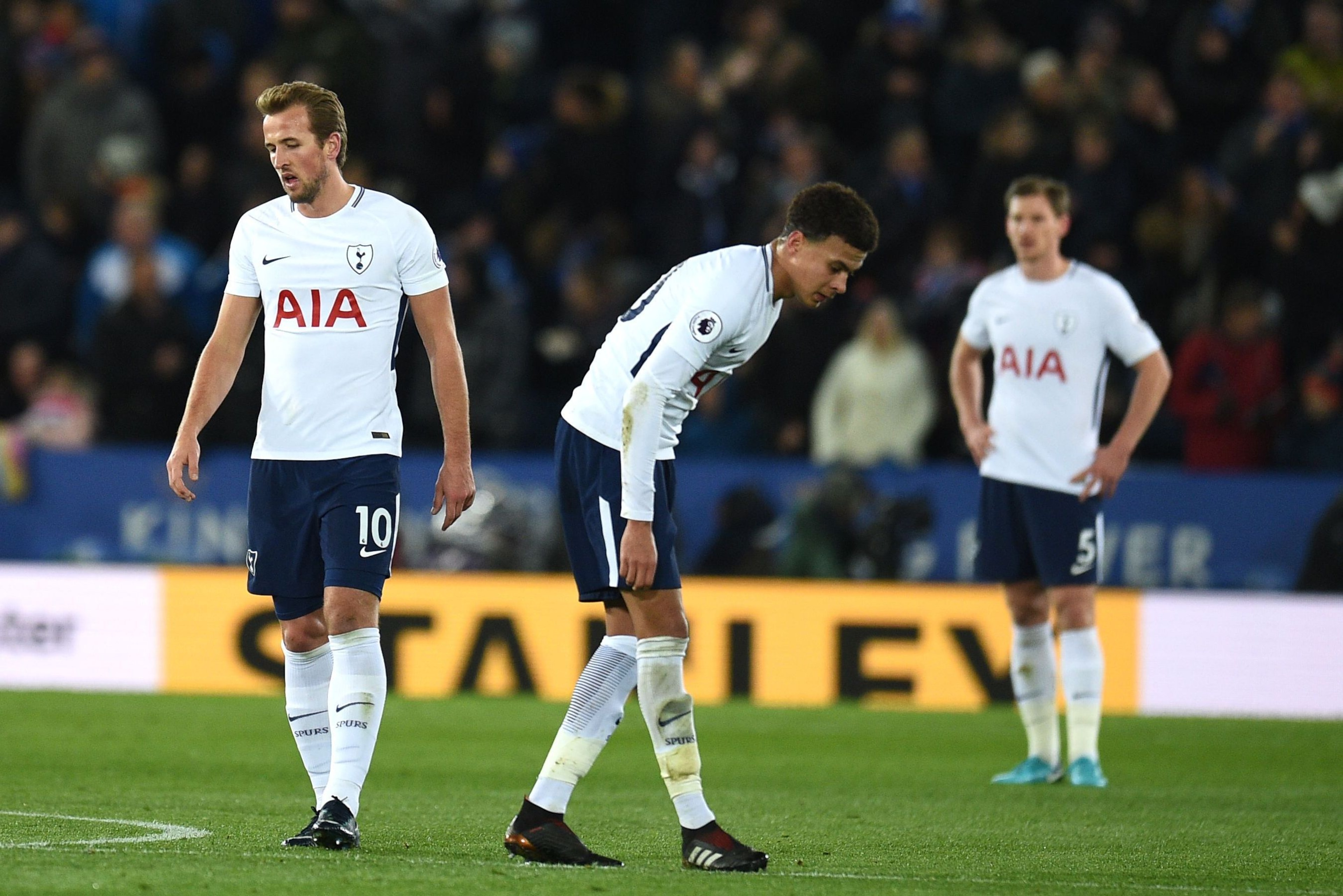 Tottenham Hotspur's English striker Harry Kane (L) and Tottenham Hotspur's English midfielder Dele Alli react after Leicester scored their second goal during the English Premier League football match between Leicester City and Tottenham Hotspur at King Po