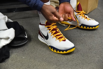 CHICAGO,IL :  Kyrie Irving #2 of the Cleveland Cavaliers laces up his sneakers prior to the game against the Chicago Bulls at the United Center before Game Six of the Eastern Conference Semifinals during the 2015 NBA Playoffs on May 14, 2015 in Chicago,Il