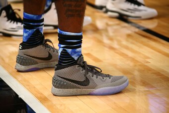 NEW YORK, NY - FEBRUARY 14: Kyrie Irving of the Eastern Conference All-Stars sneakers during NBA All-Star Practice as part of 2015 All-Star Weekend at Madison Square Garden on February 14, 2015 in New York, New York. NOTE TO USER: User expressly acknowled