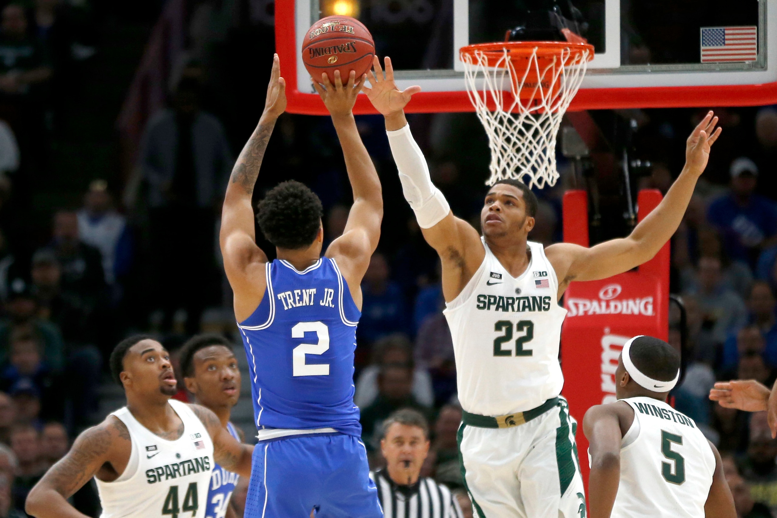 Miles Bridges contests a Gary Trent Jr. jumper.