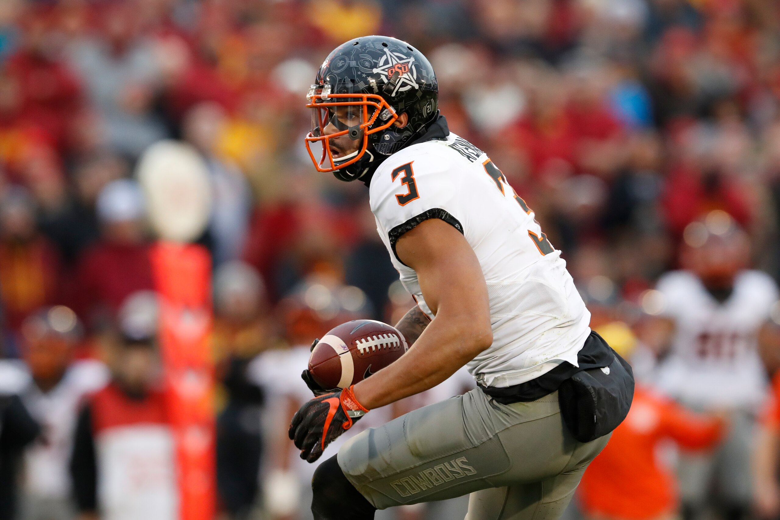 AMES, IA - NOVEMBER 11: Wide receiver Marcell Ateman #3 of the Oklahoma State Cowboys rushes for yards in the second half of play against the Iowa State Cyclones at Jack Trice Stadium on November 11, 2017 in Ames, Iowa. The Oklahoma State Cowboys won 49-4 AMES, IA - NOVEMBER 11: Wide receiver Marcell Ateman #3 of the Oklahoma State Cowboys rushes for yards in the second half of play against the Iowa State Cyclones at Jack Trice Stadium on November 11, 2017 in Ames, Iowa. The Oklahoma State Cowboys won 49-4