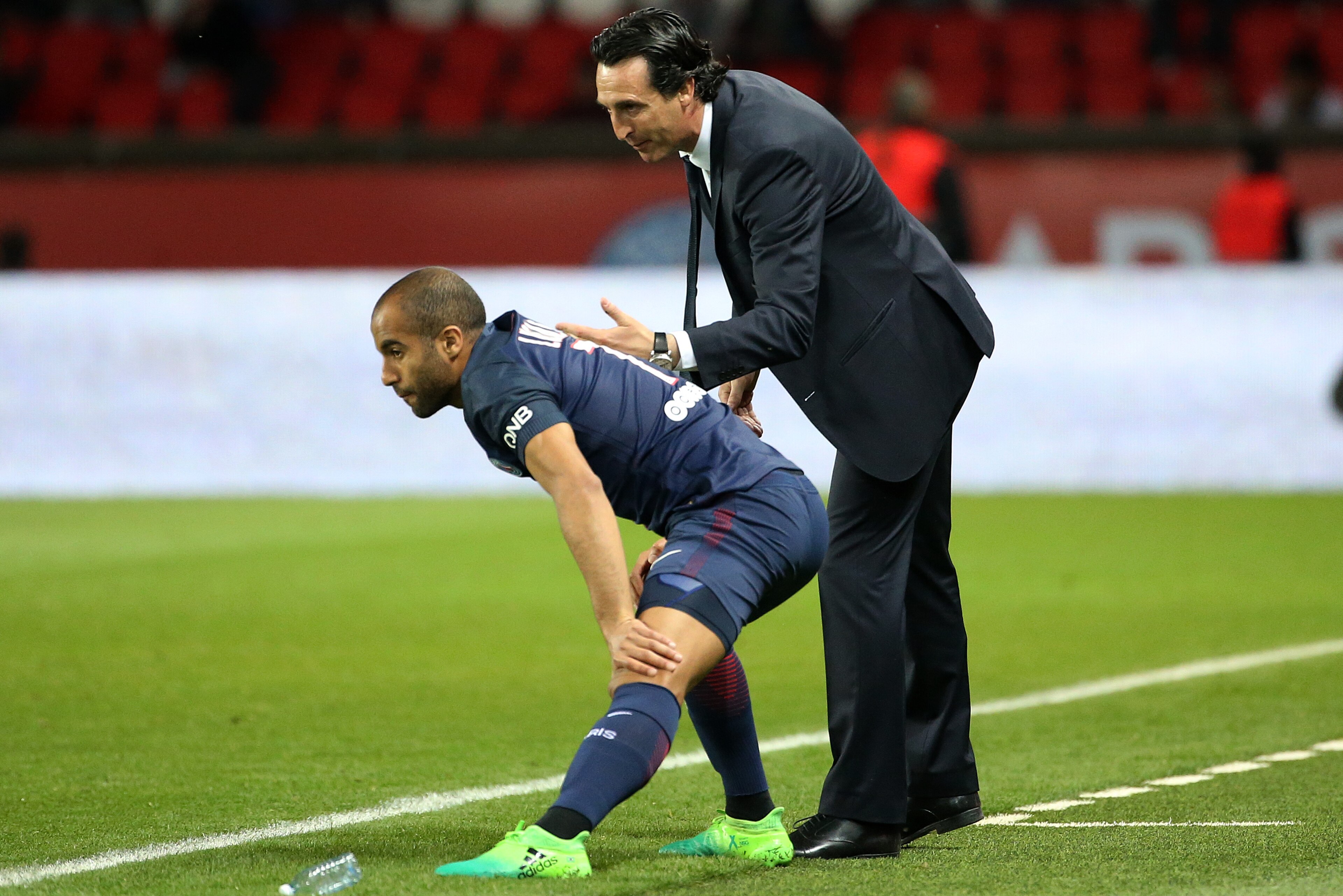PARIS, FRANCE - APRIL 9: Lucas Moura of PSG and coach of PSG Unai Emery during the French Ligue 1 match between Paris Saint-Germain (PSG) and En Avant Guingamp at Parc des Princes on April 9, 2017 in Paris, France. (Photo by Jean Catuffe/Getty Images)
