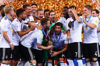SAINT PETERSBURG, RUSSIA - JULY 02: Emre Can of Germany lifts the trophy following the FIFA Confederations Cup Russia 2017 Final match between Chile and Germany at Saint Petersburg Stadium on July 2, 2017 in Saint Petersburg, Russia. (Photo by Chris Bruns