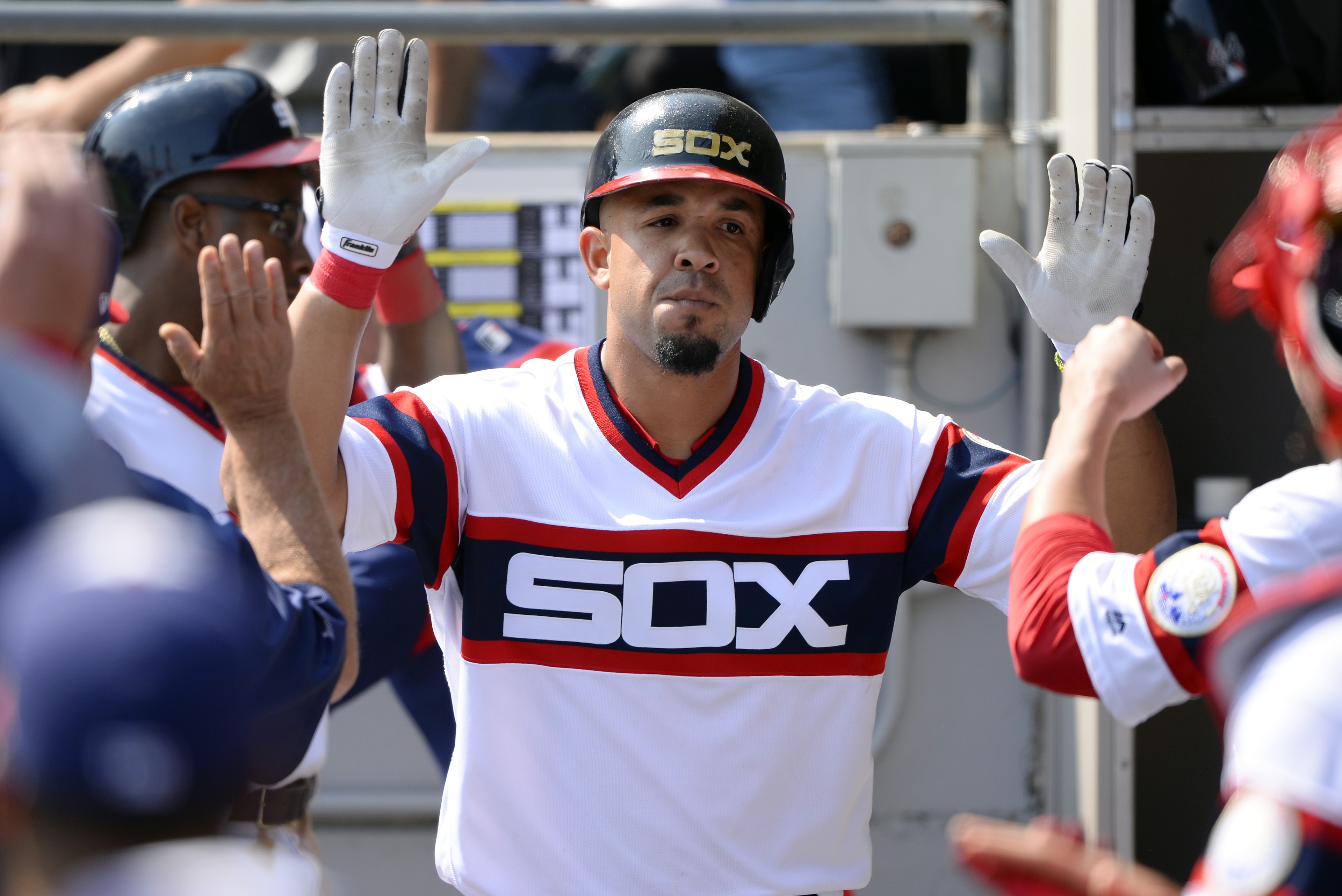 CHICAGO - SEPTEMBER 10:  Jose Abreu #79 of the Chicago White Sox celebrates with teammates after hitting his 30th home run of the season against the San Francisco Giants on September 10, 2017 at Guaranteed Rate Field in Chicago, Illinois.  The White Sox d