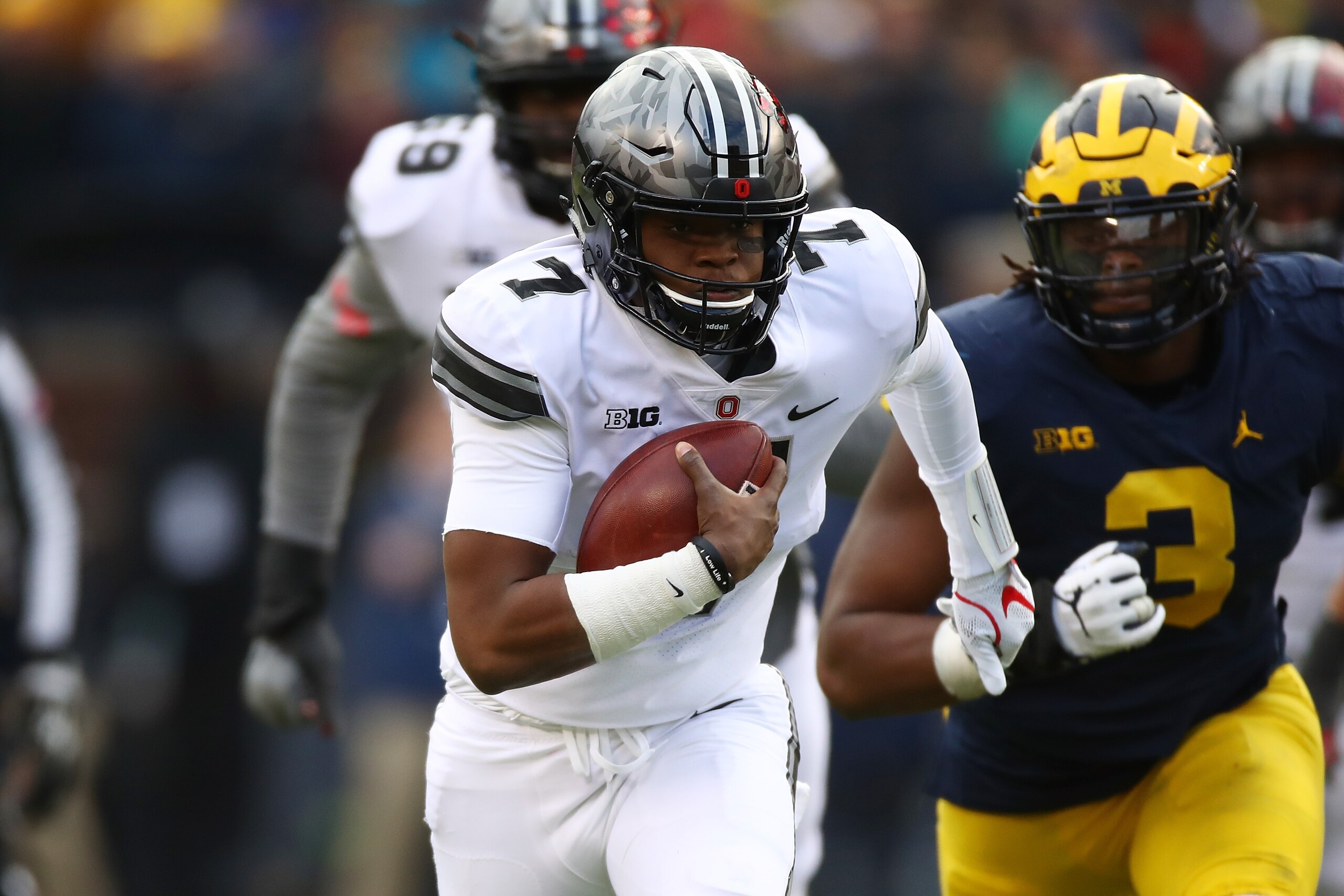 ANN ARBOR, MI - NOVEMBER 25: Dwayne Haskins #7 of the Ohio State Buckeyes runs the ball in the second half against the Michigan Wolverines on November 25, 2017 at Michigan Stadium in Ann Arbor, Michigan. (Photo by Gregory Shamus/Getty Images)