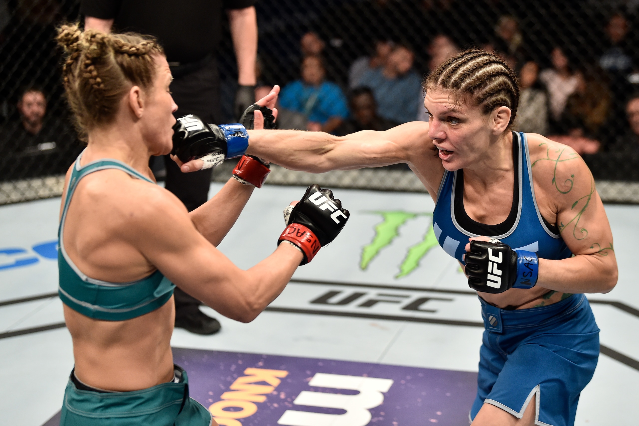 LAS VEGAS, NV - DECEMBER 01:  (R-L) Lauren Murphy punches Barb Honchak in their women's flyweight bout during the TUF Finale event inside Park Theater on December 01, 2017 in Las Vegas, Nevada. (Photo by Jeff Bottari/Zuffa LLC/Zuffa LLC via Getty Images)