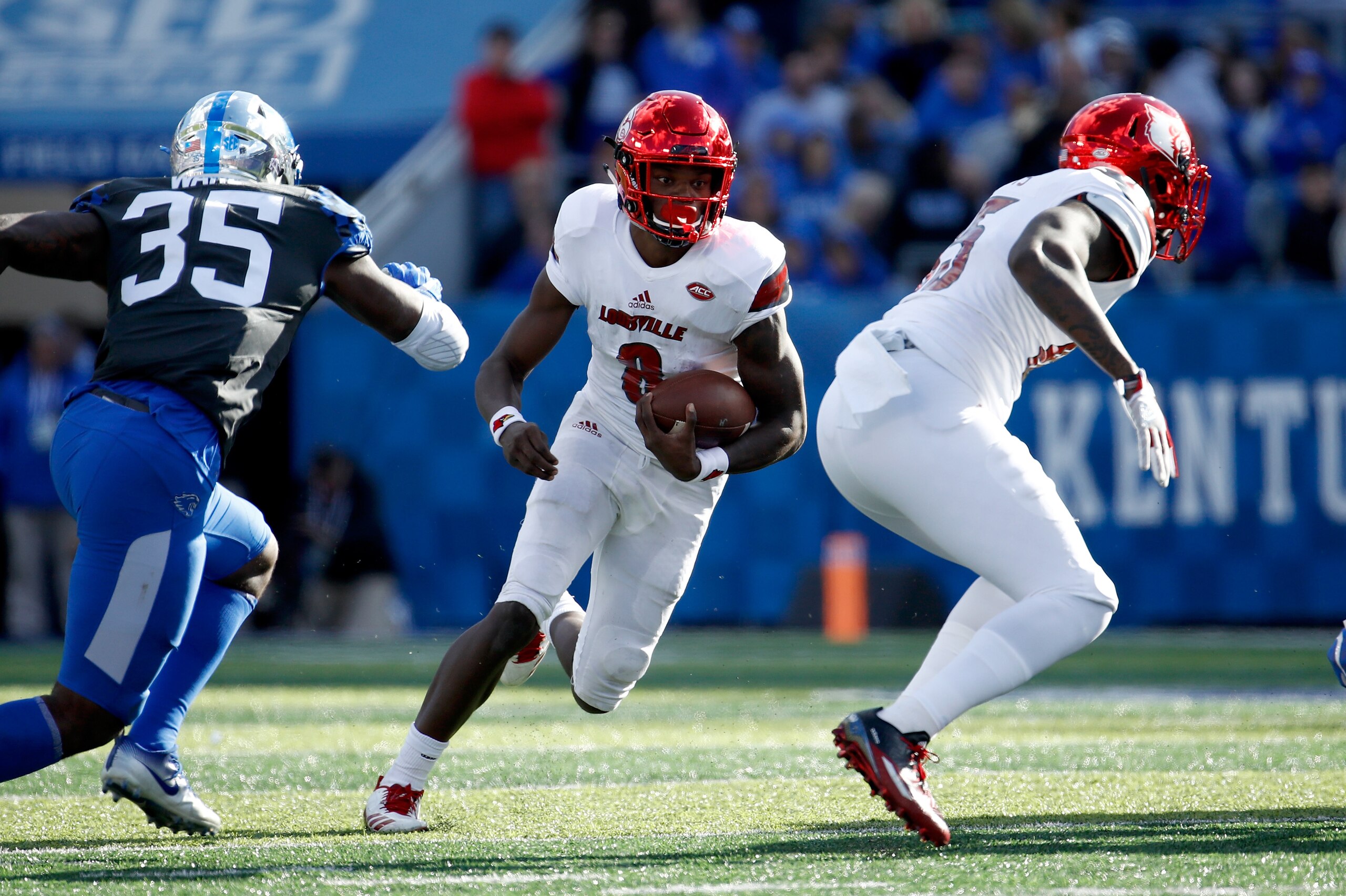 LEXINGTON, KY - NOVEMBER 25: Lamar Jackson #8 of the Louisville Cardinals runs with the ball against the Kentucky Wildcats during the game at Commonwealth Stadium on November 25, 2017 in Lexington, Kentucky. (Photo by Andy Lyons/Getty Images) LEXINGTON, KY - NOVEMBER 25: Lamar Jackson #8 of the Louisville Cardinals runs with the ball against the Kentucky Wildcats during the game at Commonwealth Stadium on November 25, 2017 in Lexington, Kentucky. (Photo by Andy Lyons/Getty Images)