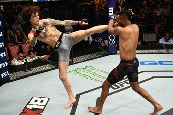 LAS VEGAS, NV - DECEMBER 01:  (L-R) Sean O'Malley kicks Terrion Ware in their bantamweight bout during the TUF Finale event inside Park Theater on December 01, 2017 in Las Vegas, Nevada. (Photo by Jeff Bottari/Zuffa LLC/Zuffa LLC via Getty Images)