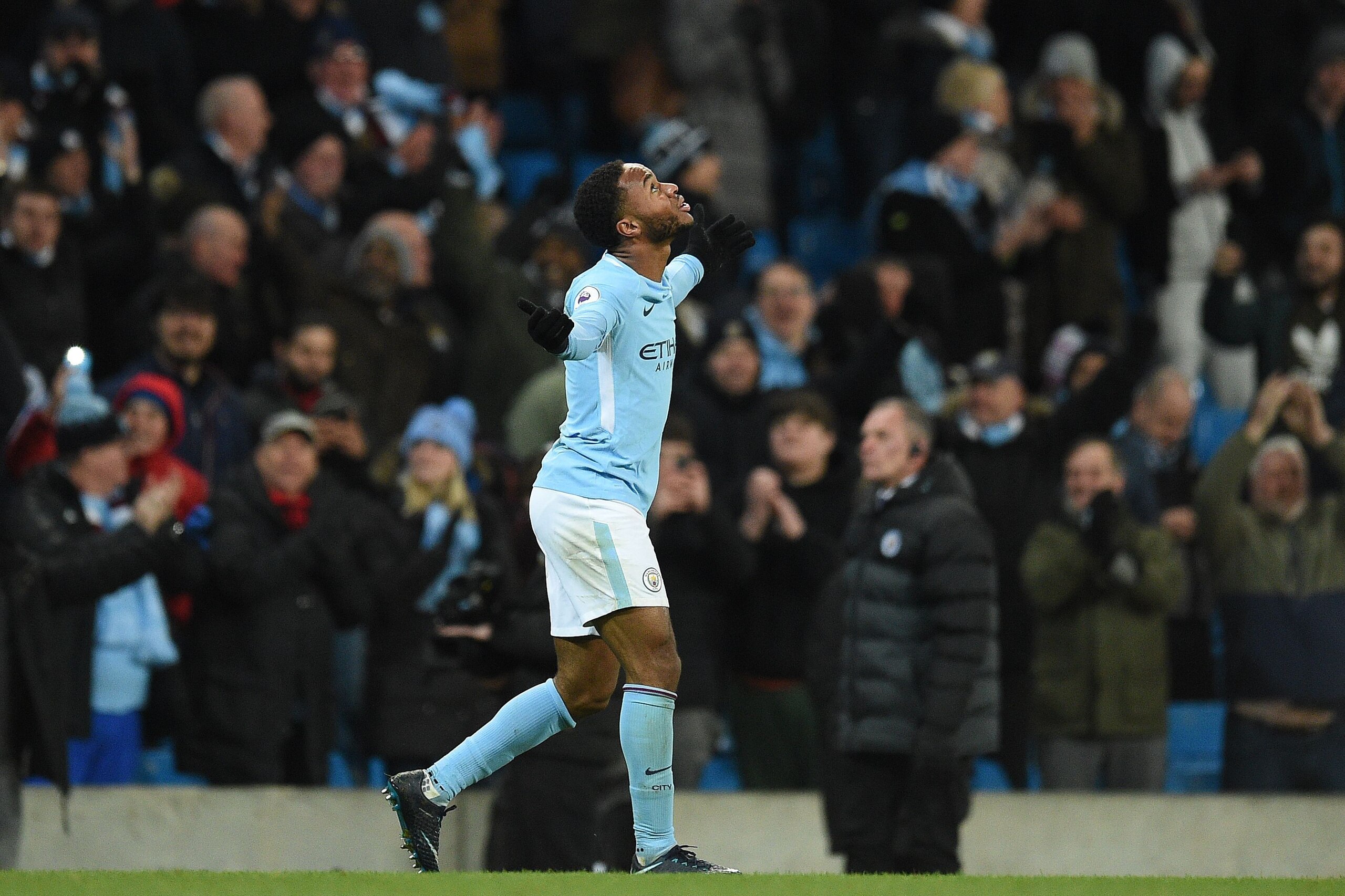 Manchester City's English midfielder Raheem Sterling celebrates scoring his team's second goal during the English Premier League football match between Manchester City and Southampton at the Etihad Stadium in Manchester, north west England, on November 29