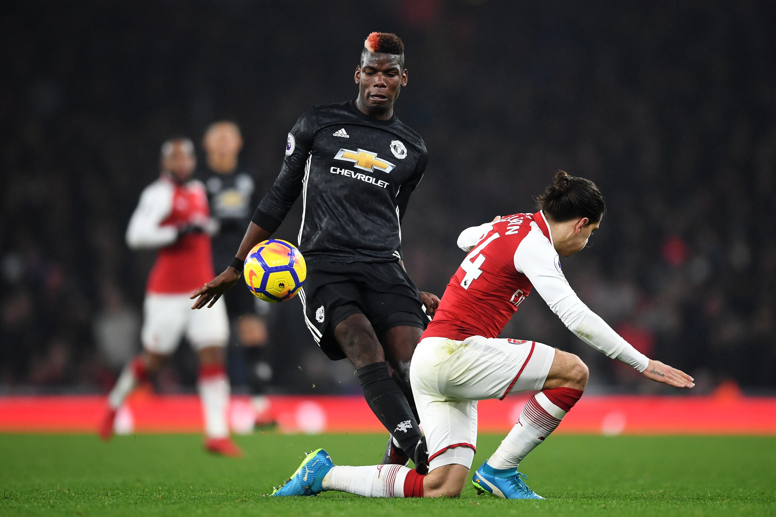 LONDON, ENGLAND - DECEMBER 02:  Paul Pogba of Manchester United stamps on Hector Bellerin of Arsenal and is later sent off for the challenge during the Premier League match between Arsenal and Manchester United at Emirates Stadium on December 2, 2017 in L
