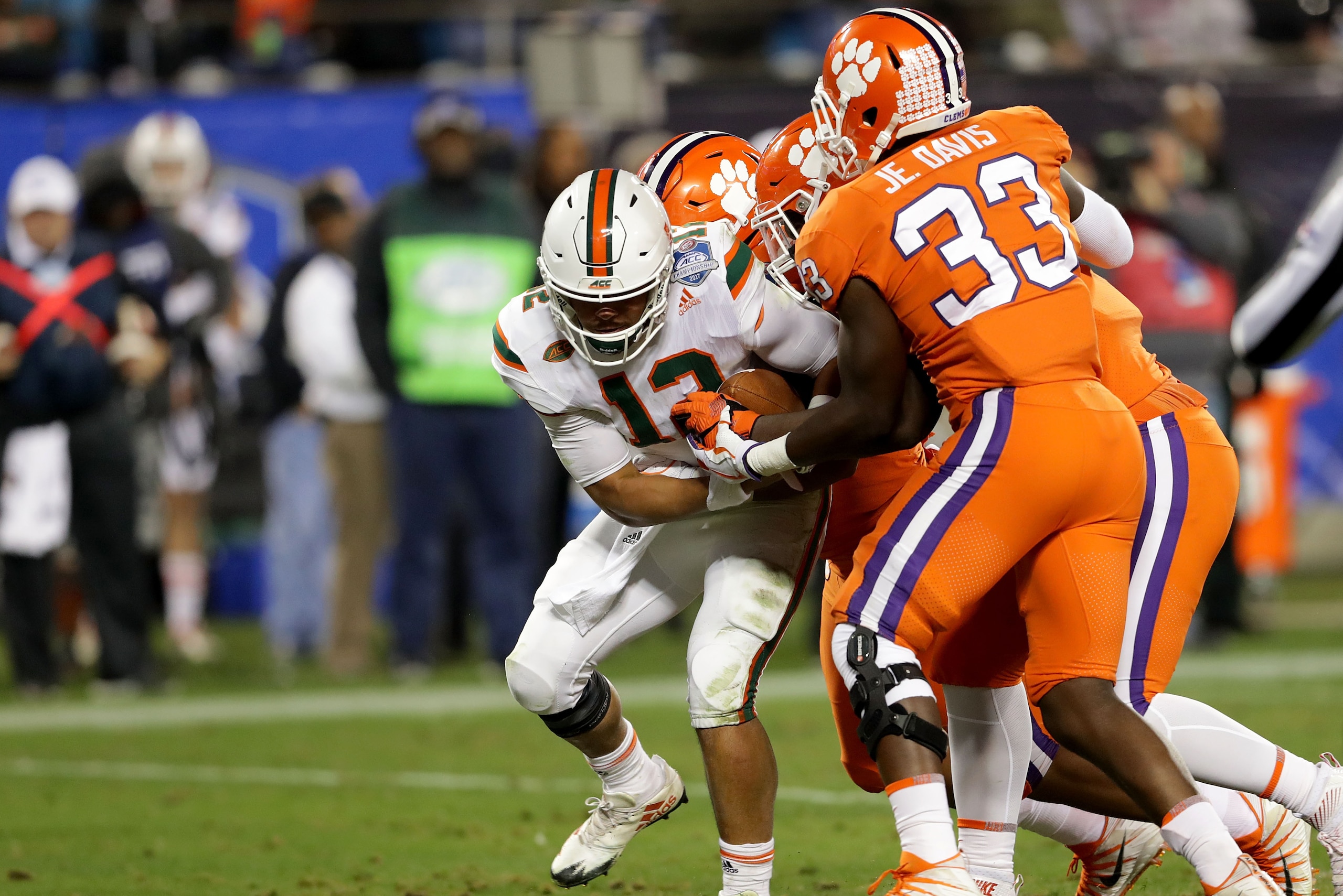 CHARLOTTE, NC - DECEMBER 02:  Malik Rosier #12 of the Miami Hurricanes runs the ball against the Clemson Tigers in the third quarter during the ACC Football Championship at Bank of America Stadium on December 2, 2017 in Charlotte, North Carolina.  (Photo 